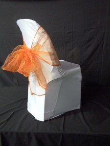 chair with orange draping